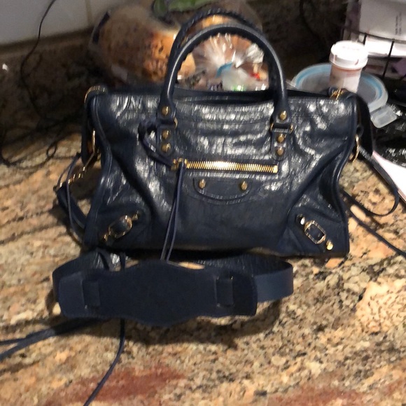 Balenciaga navy small. Selling 865.